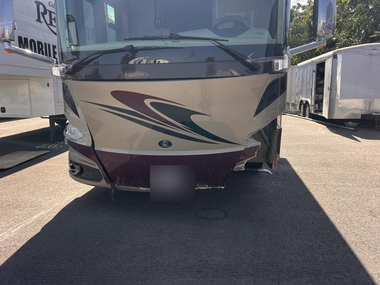 Motorhome fiberglass body damage before repair
